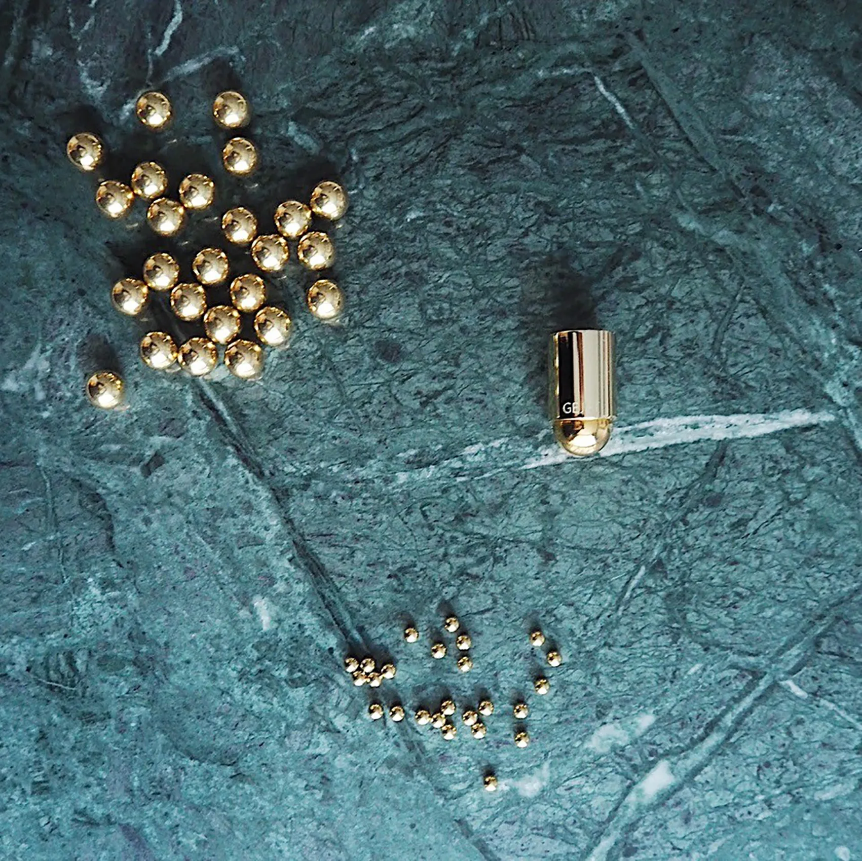 Suporte de velas Molekyl 1, latão Gejst