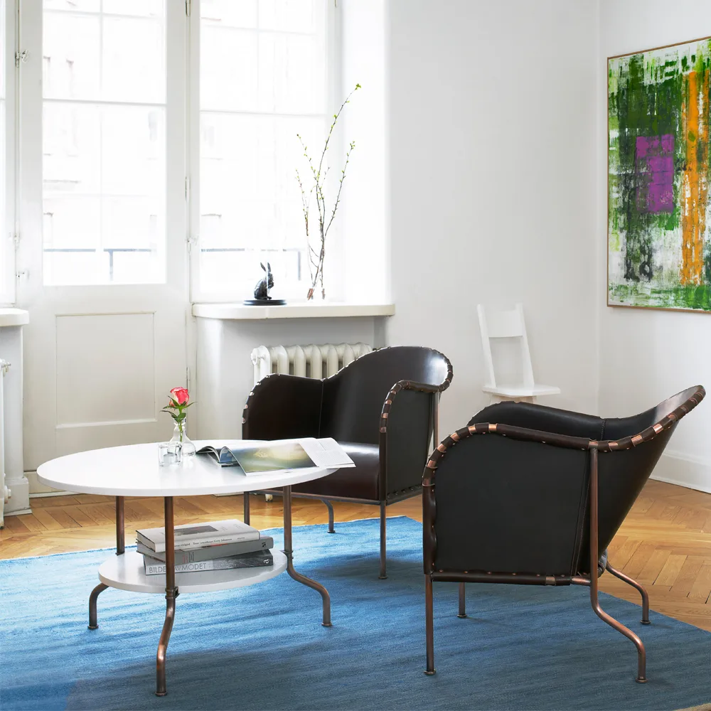 Bruno poltrona, Couro natural-base de metal latonado Källemo