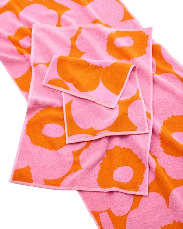 Unikko toalha de hóspedes 30x50 cm - Orange-pink - Marimekko