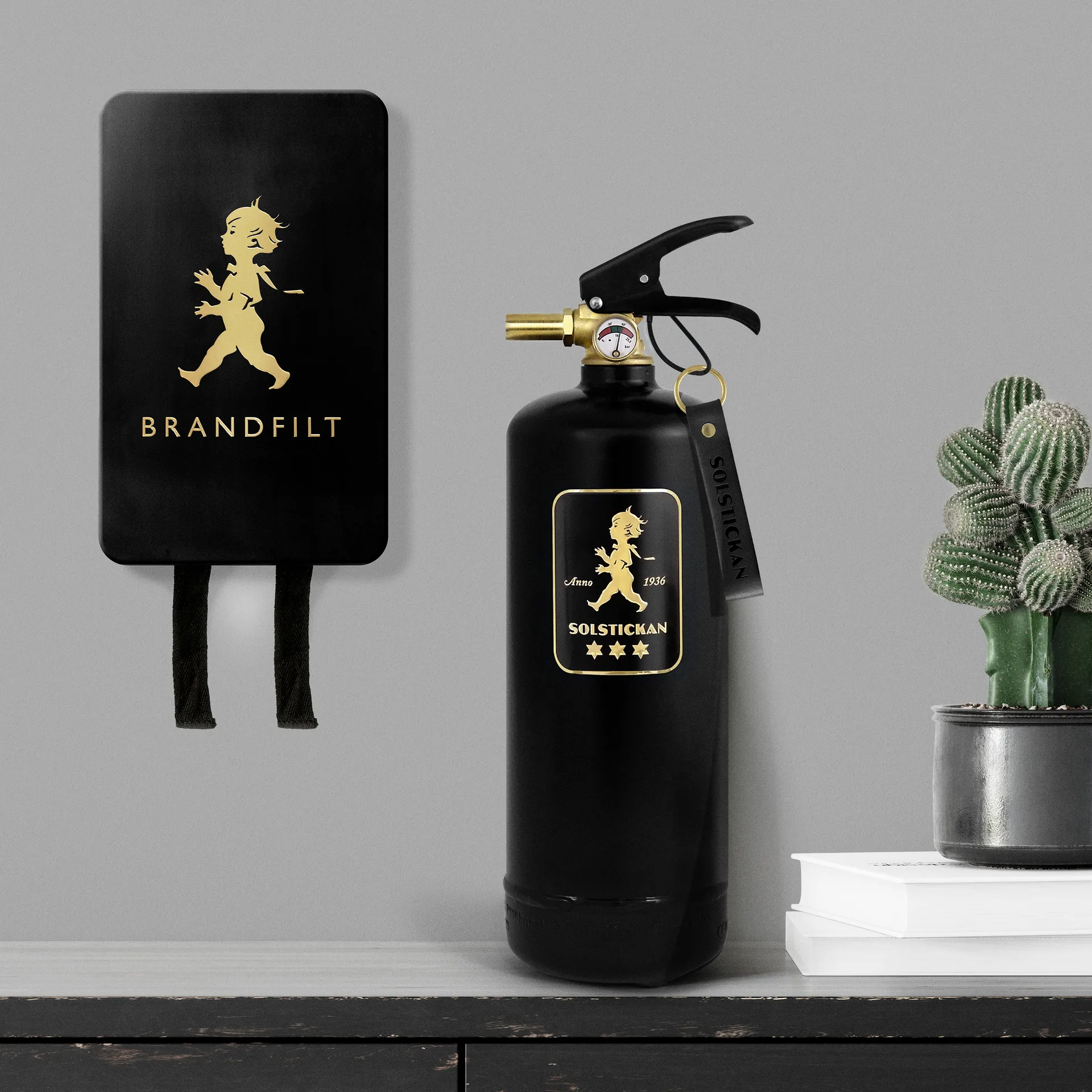 Solstickan extintor de incêndio 2 kg, Preto-ouro Solstickan Design