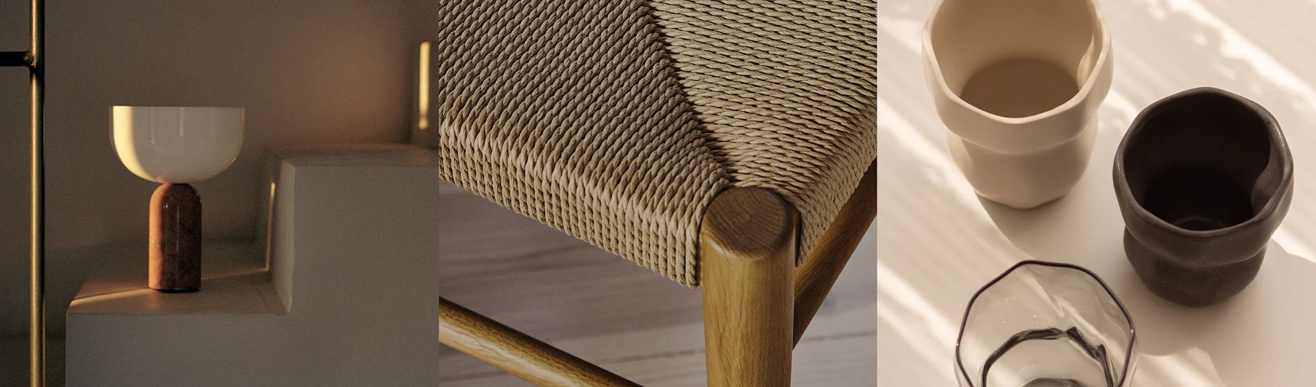 Uma lâmpada moderna, um assento de cadeira trançado e duas canecas de cerâmica com uma tigela de vidro, tudo em tons quentes.